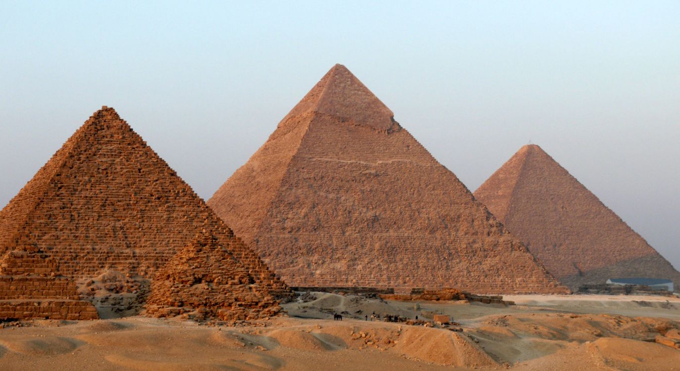 brown pyramid on brown sand during daytime