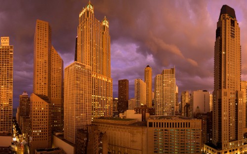 Image high rise buildings under cloudy sky during daytime