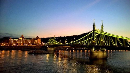 Image bridge over water during night time