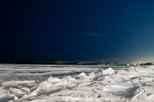 Image snow covered field under blue sky during daytime