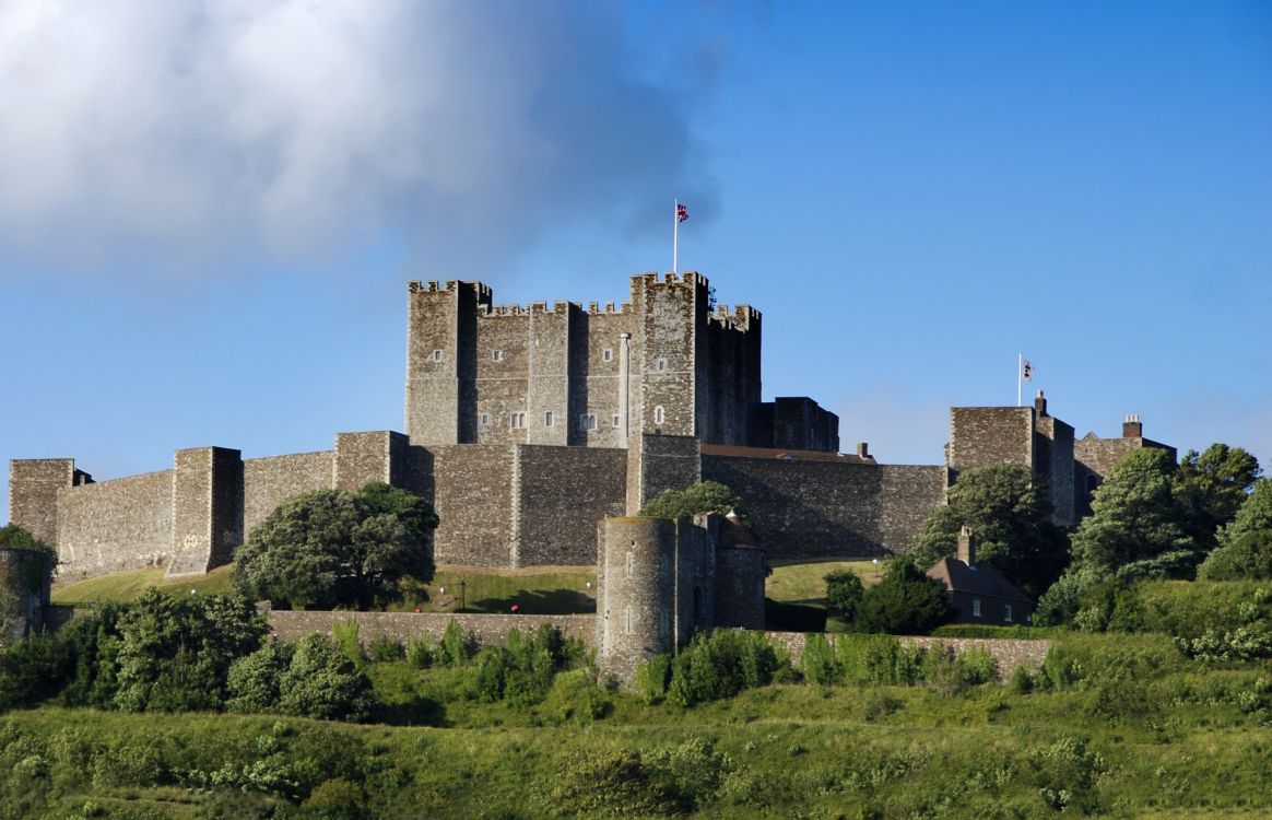 gray concrete castle under gray clouds