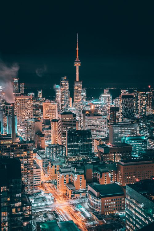 Ville Avec Des Immeubles de Grande Hauteur Pendant la Nuit. Wallpaper in 4016x6016 Resolution