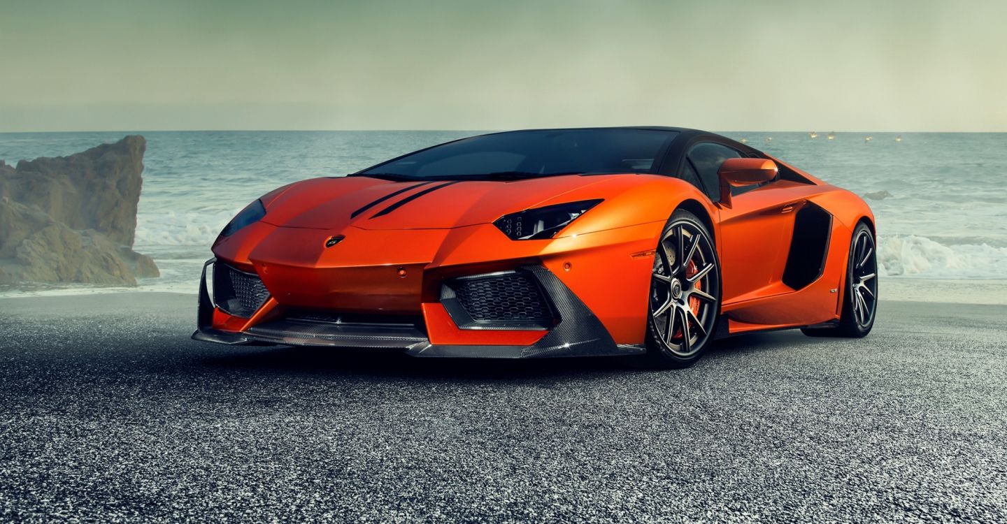 Roter Ferrari 458 Italia Auf Grauem Sand in Der Nähe Des Meeres Tagsüber. Wallpaper in 2074x1080 Resolution