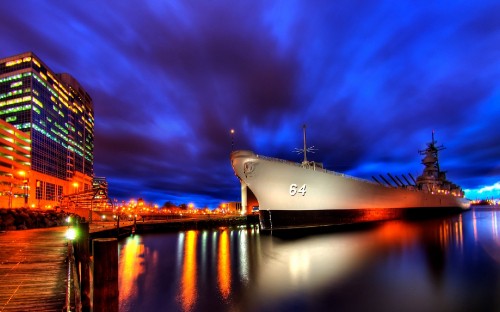 Image white ship on water during night time