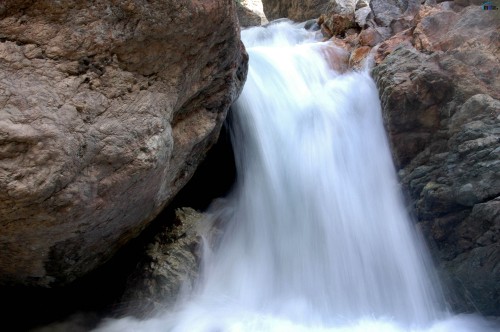 Image water falls on brown rock