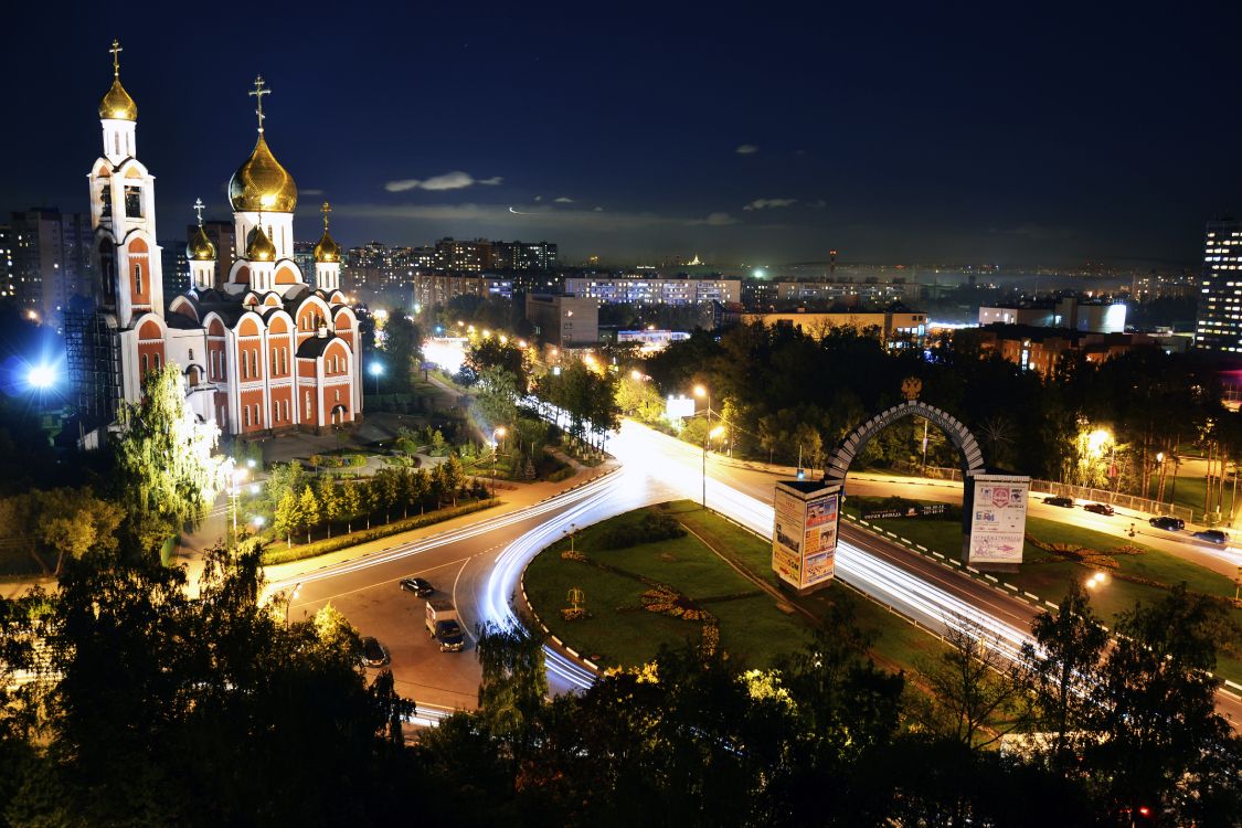 city with high rise buildings during night time