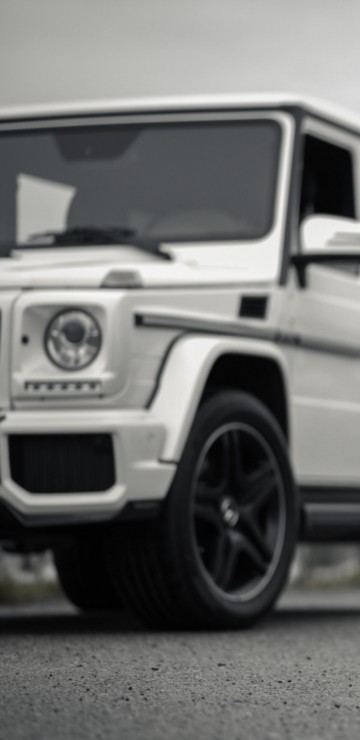 Image grayscale photo of suv on road