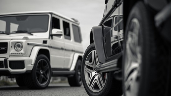 Image grayscale photo of suv on road