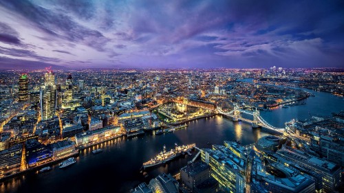 Image aerial view of city buildings during night time