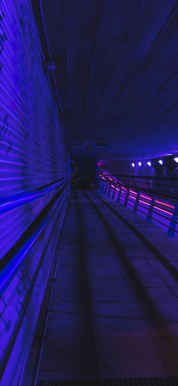 Image blue light on tunnel during night time