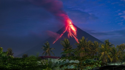 Image lightning strike on mountain during night time