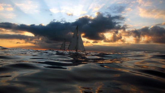 Image sailboat on sea under cloudy sky during daytime