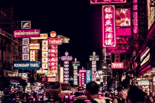 Image people walking on street during nighttime