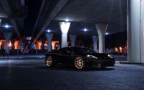 Image black porsche 911 parked on parking lot