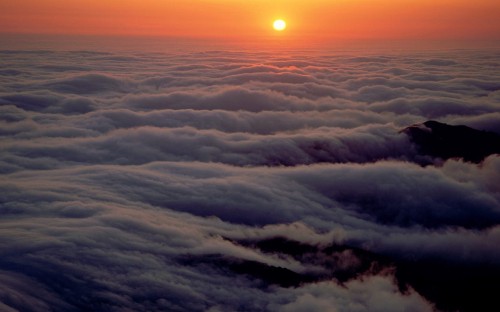 Image white clouds and sun during daytime