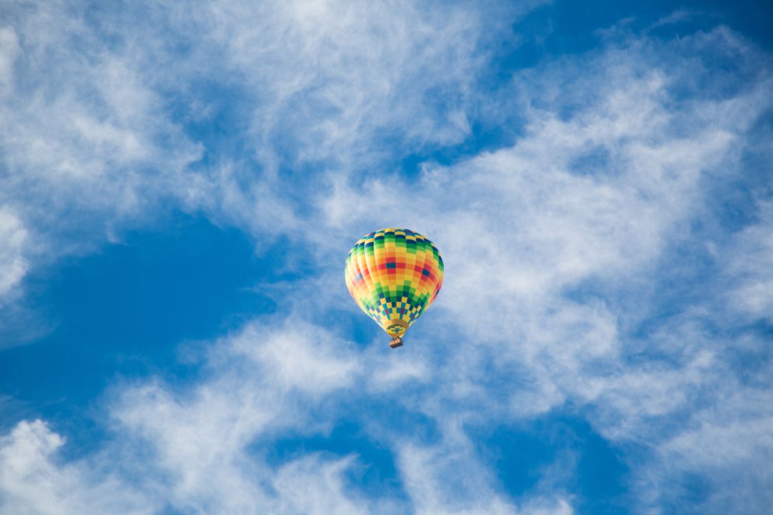 Yellow Hot Air Balloon in Mid Air Under Blue Sky During Daytime. Wallpaper in 5760x3840 Resolution