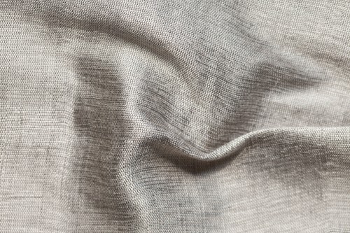 Image white textile on brown wooden table