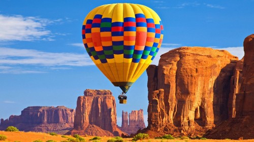 Image yellow blue and red hot air balloon