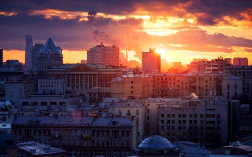 Image white and brown concrete buildings during sunset