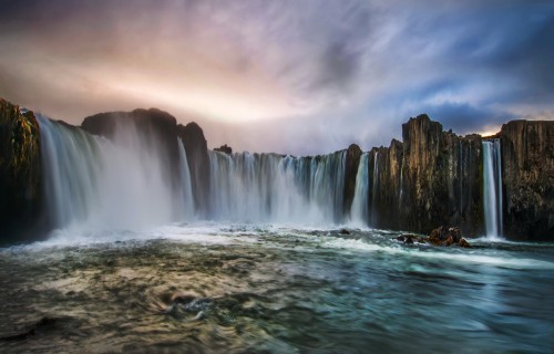 Image water falls under cloudy sky