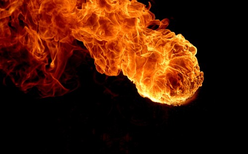 Image orange fire in black background