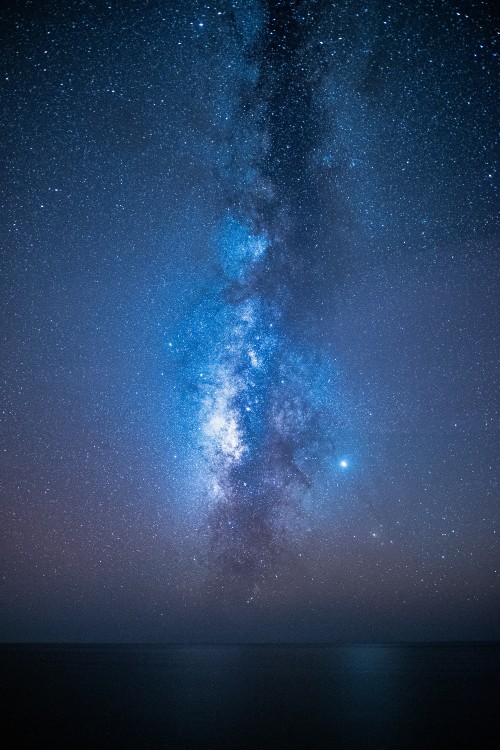 Image blue and black starry night sky