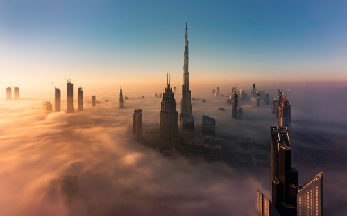 Image silhouette of city buildings during sunset