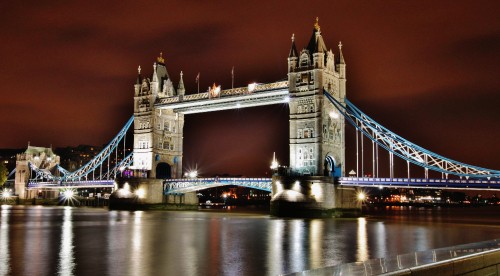 Image white and brown concrete bridge during night time