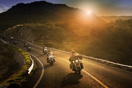 Image people riding motorcycle on road during daytime