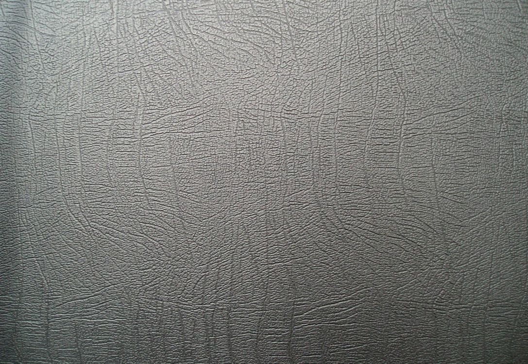 black leather textile in close up photography