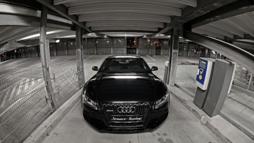 Image black porsche 911 parked in building