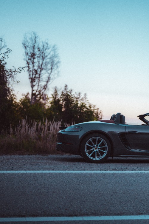 Image black porsche 911 on road during daytime