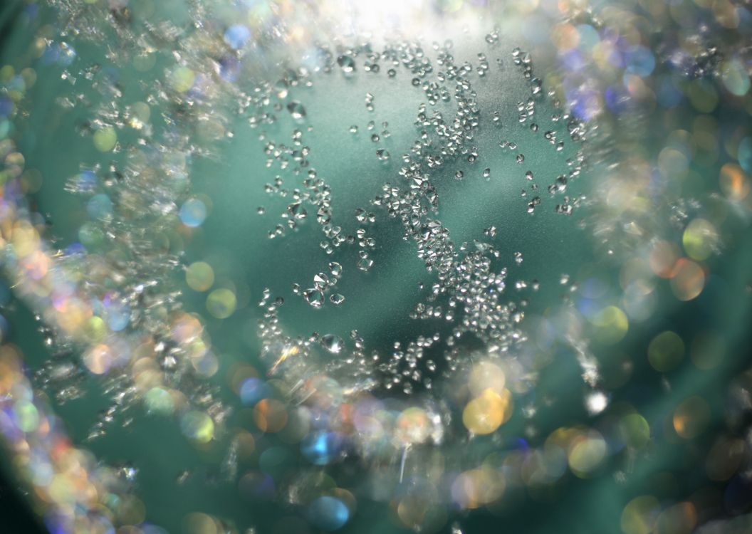 water droplets on glass during daytime