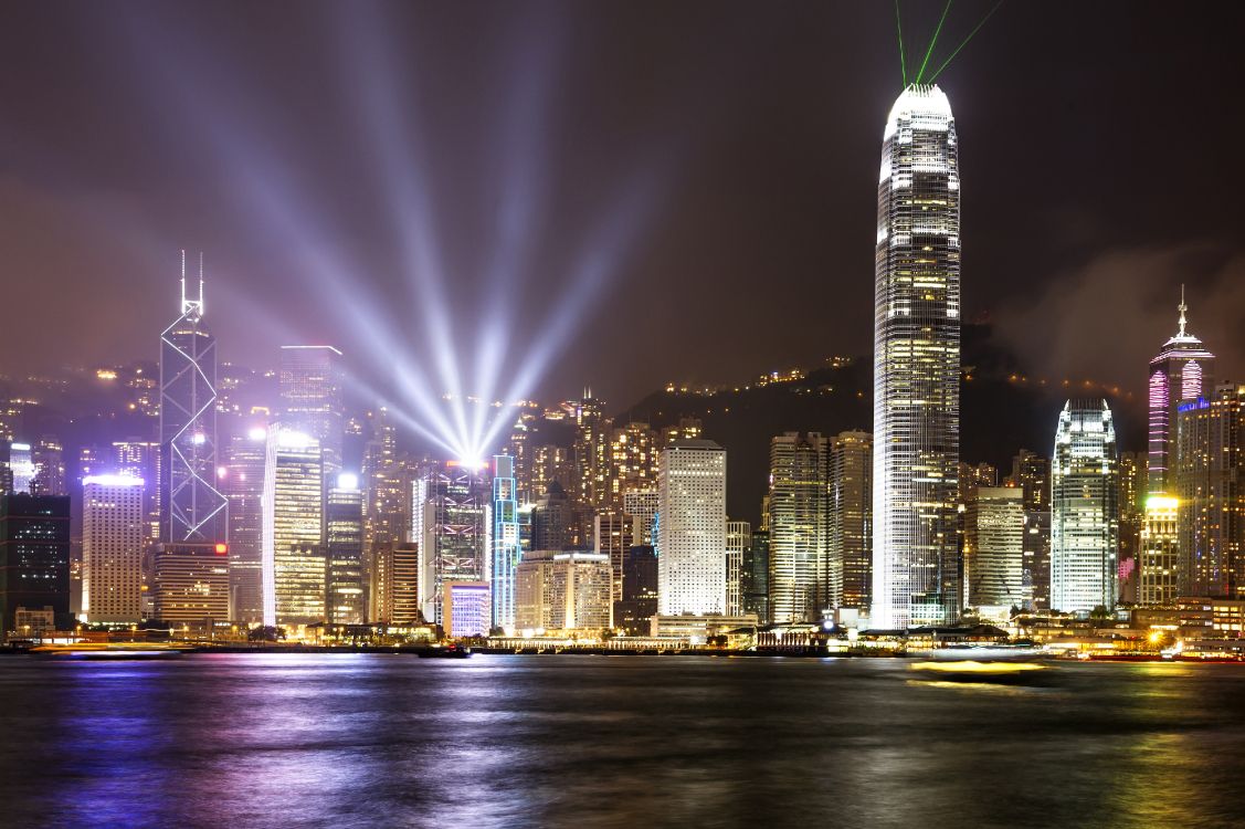 city skyline during night time