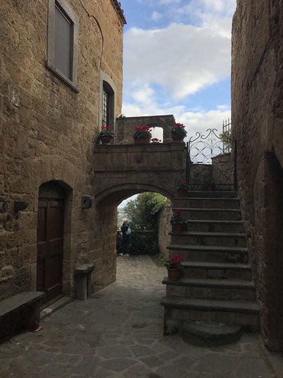 people walking on concrete stairs during daytime