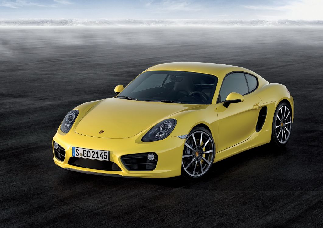 Yellow Porsche 911 on Beach Shore. Wallpaper in 3264x2307 Resolution