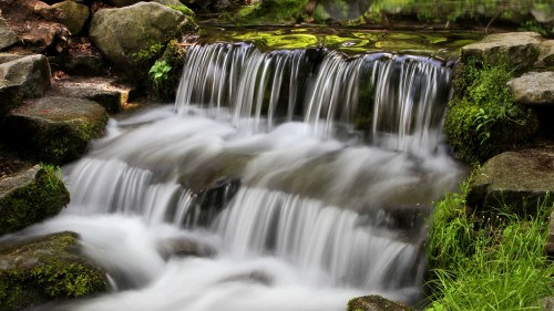 Image time lapse photography of water falls