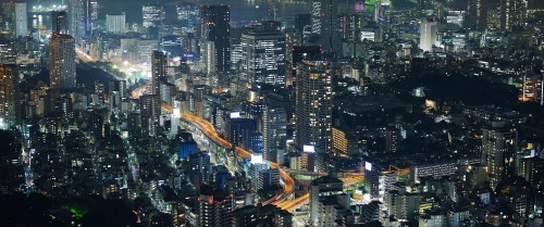 Image aerial view of city buildings during night time