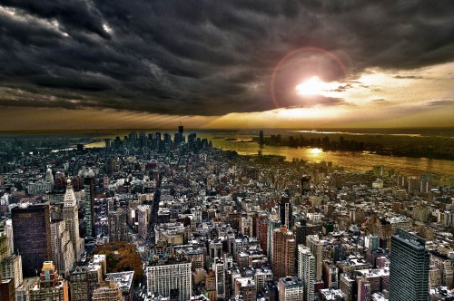 Image aerial view of city during sunset