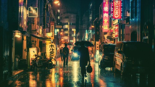 Image people walking on street during night time