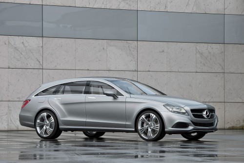 Image silver mercedes benz coupe parked beside brown wall