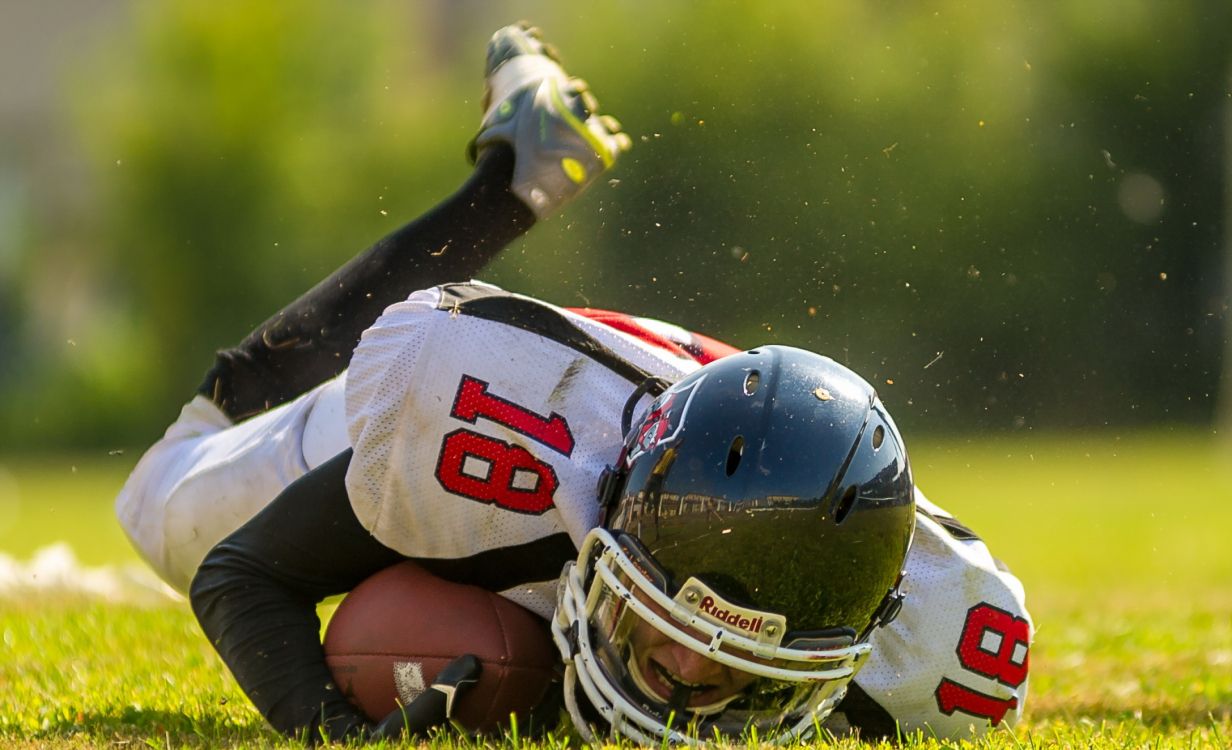 football player in white and red jersey shirt