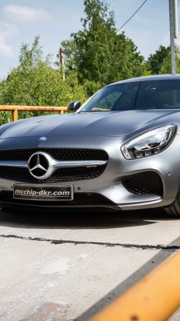 Image black mercedes benz coupe parked on gray concrete pavement during daytime
