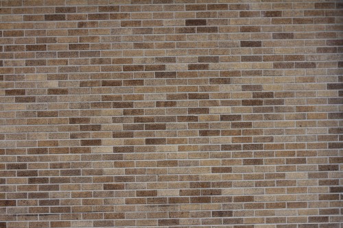 Image brown brick wall during daytime