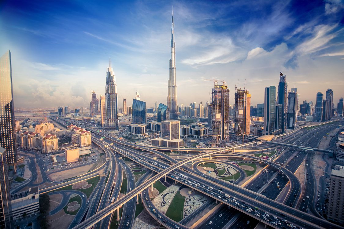 city buildings under blue sky during daytime