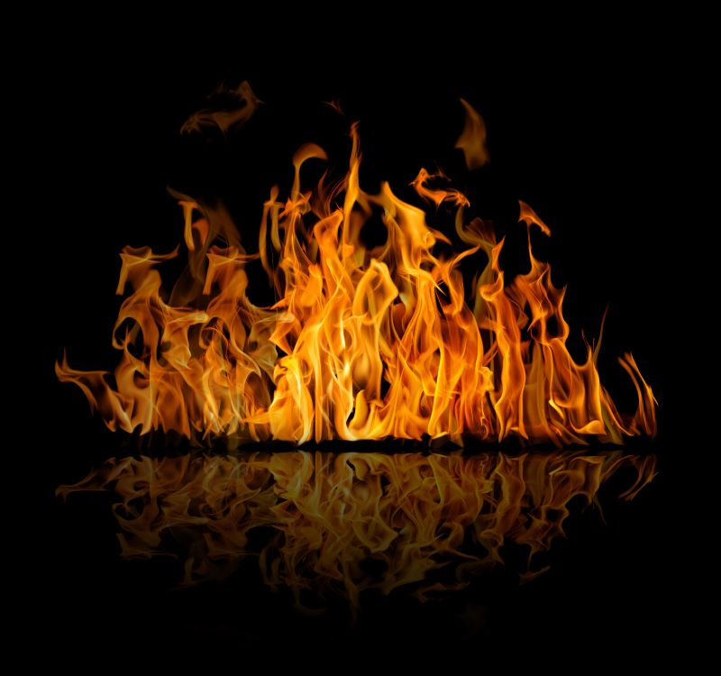 fire in black background with black background