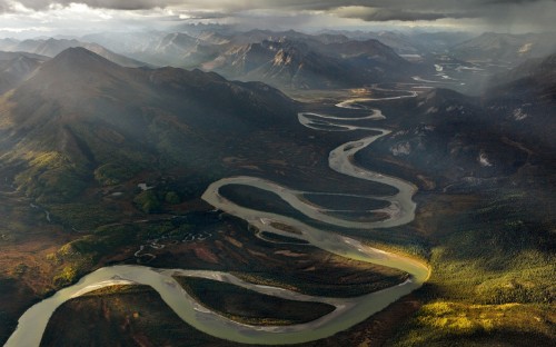 Image aerial view of green and brown mountains during daytime