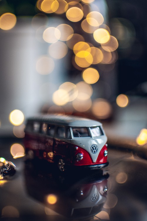 Image red and white volkswagen t-1 on road during night time