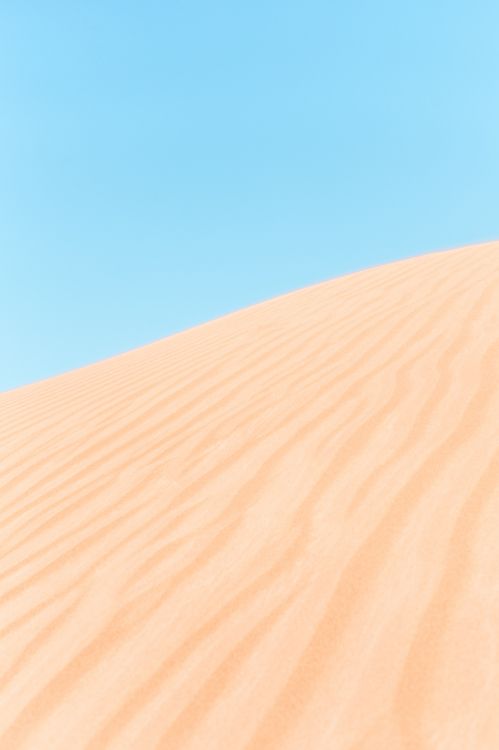 Sable Brun Sous Ciel Bleu Pendant la Journée. Wallpaper in 3517x5276 Resolution