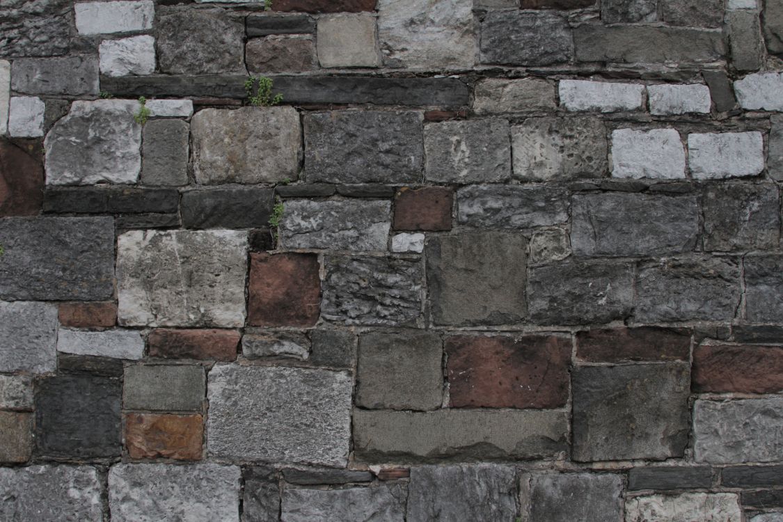 brown and gray brick wall